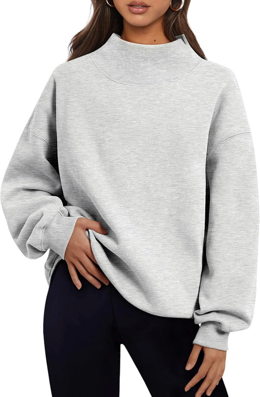 Reverse Appliqué Mock Neck Sweater