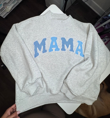 Reverse Appliqué Mock Neck Sweater