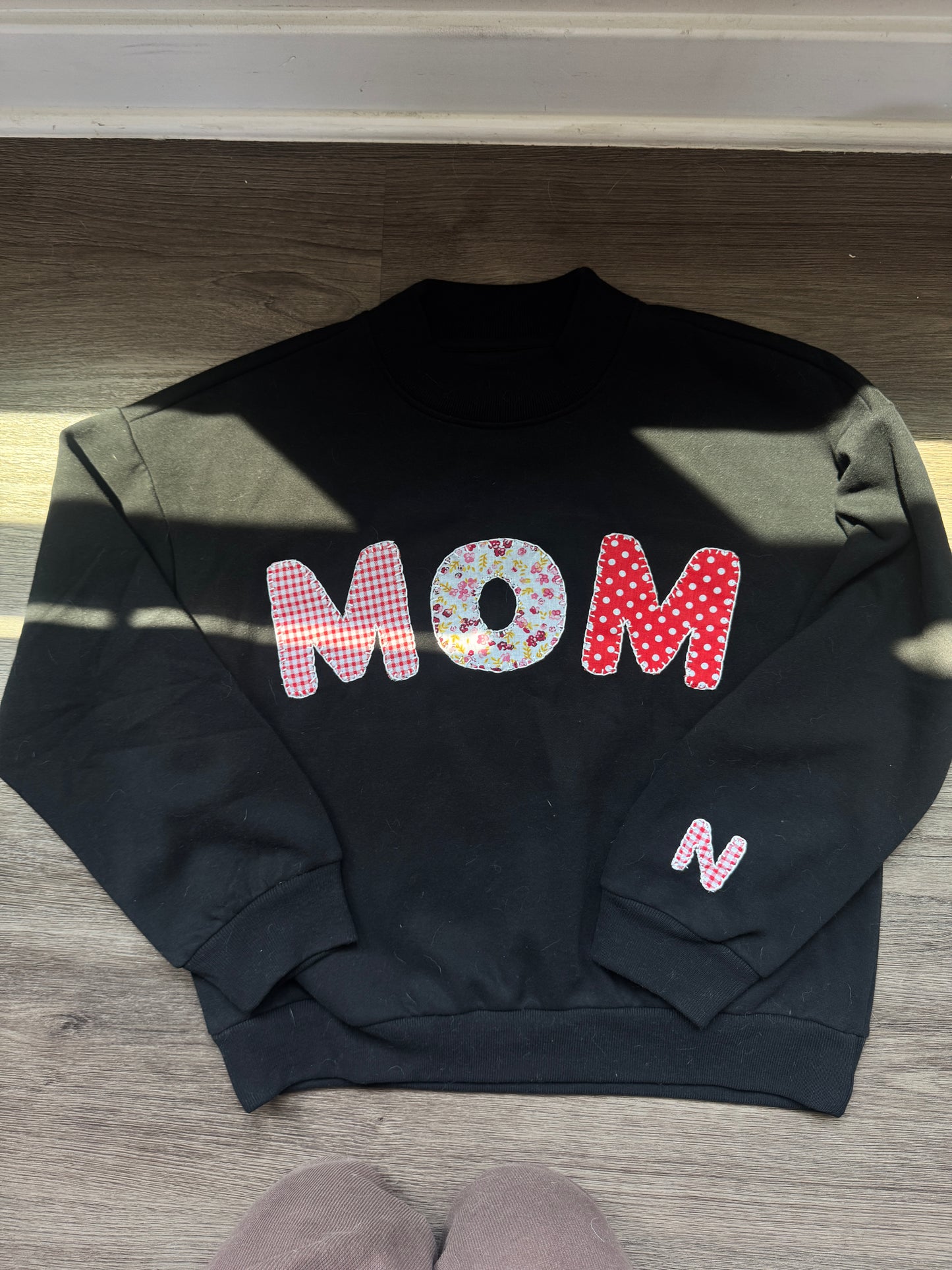 Reverse Appliqué Mock Neck Sweater